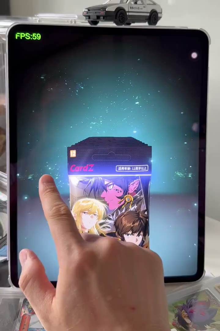 iPadでカードの開封を操作する実写映像